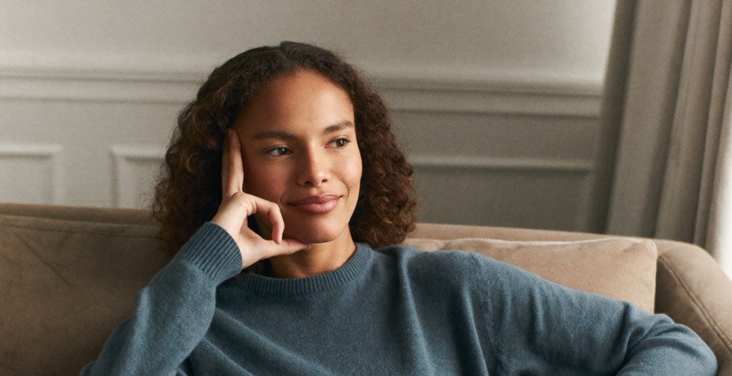 A woman relaxing comfortably at home during recovery