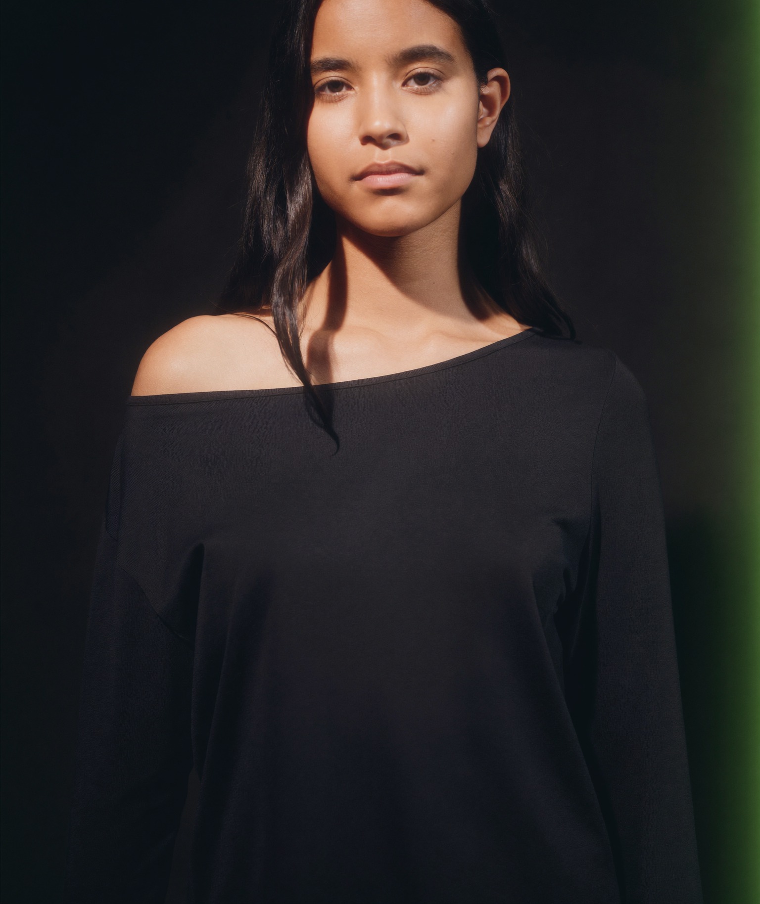 A confident, self-possessed woman standing tall, making her own decision