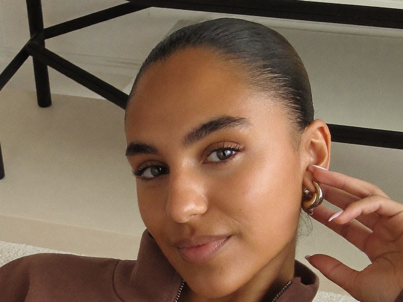 A confident woman at home, calm and in control during an easy recovery